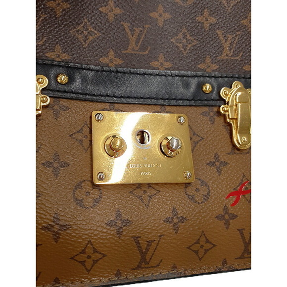Louis Vuitton Monogram Reverse Trunk Clutch Bag